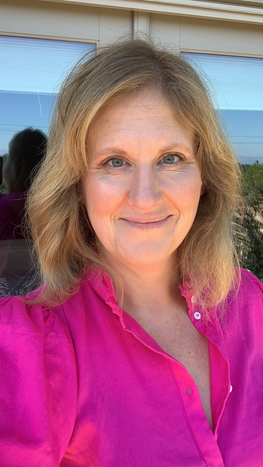Carrie Mclean in pink shirt