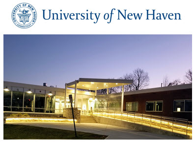 university of new haven seal and words above a lit brick building at twilight