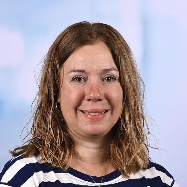 mary wears a navy and white striped top