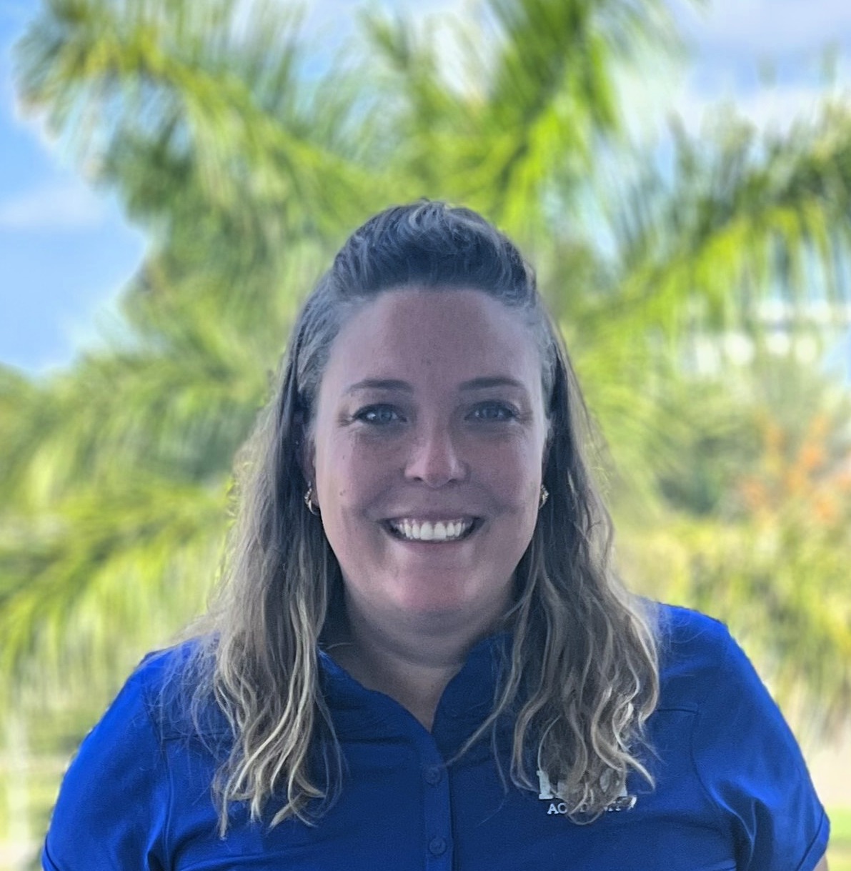Lindsay Sundberg in blue shirt