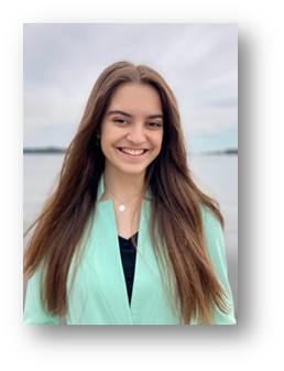 lauren kemmer, an occupational therapy graduate, by the seashore