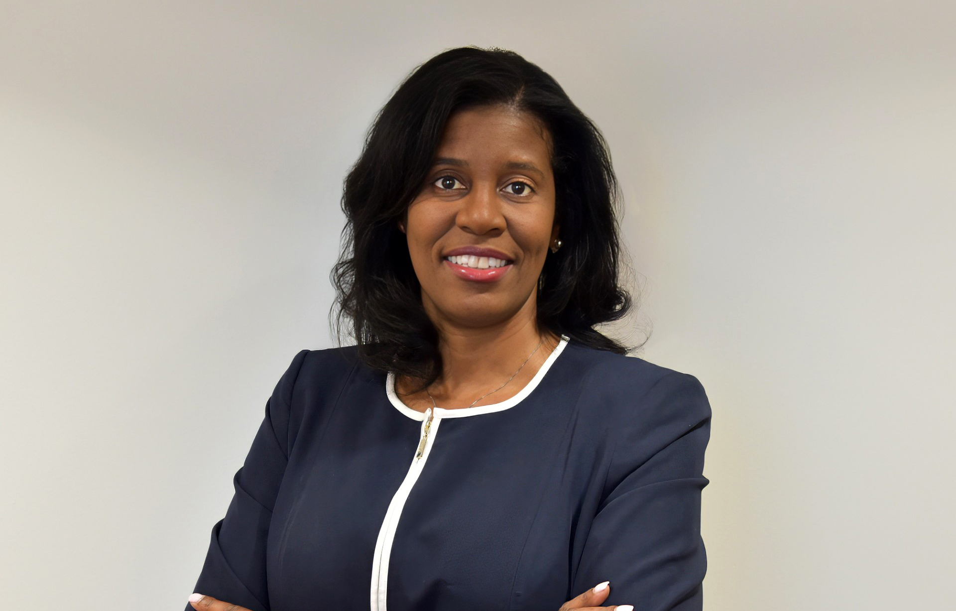 Professional headshot of woman in business attire