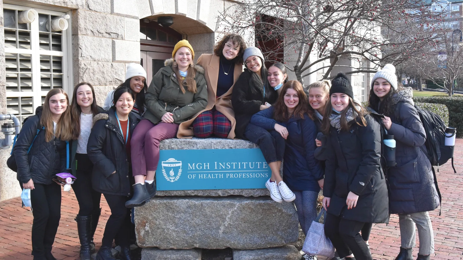 female students outside of the Shouse building on campus