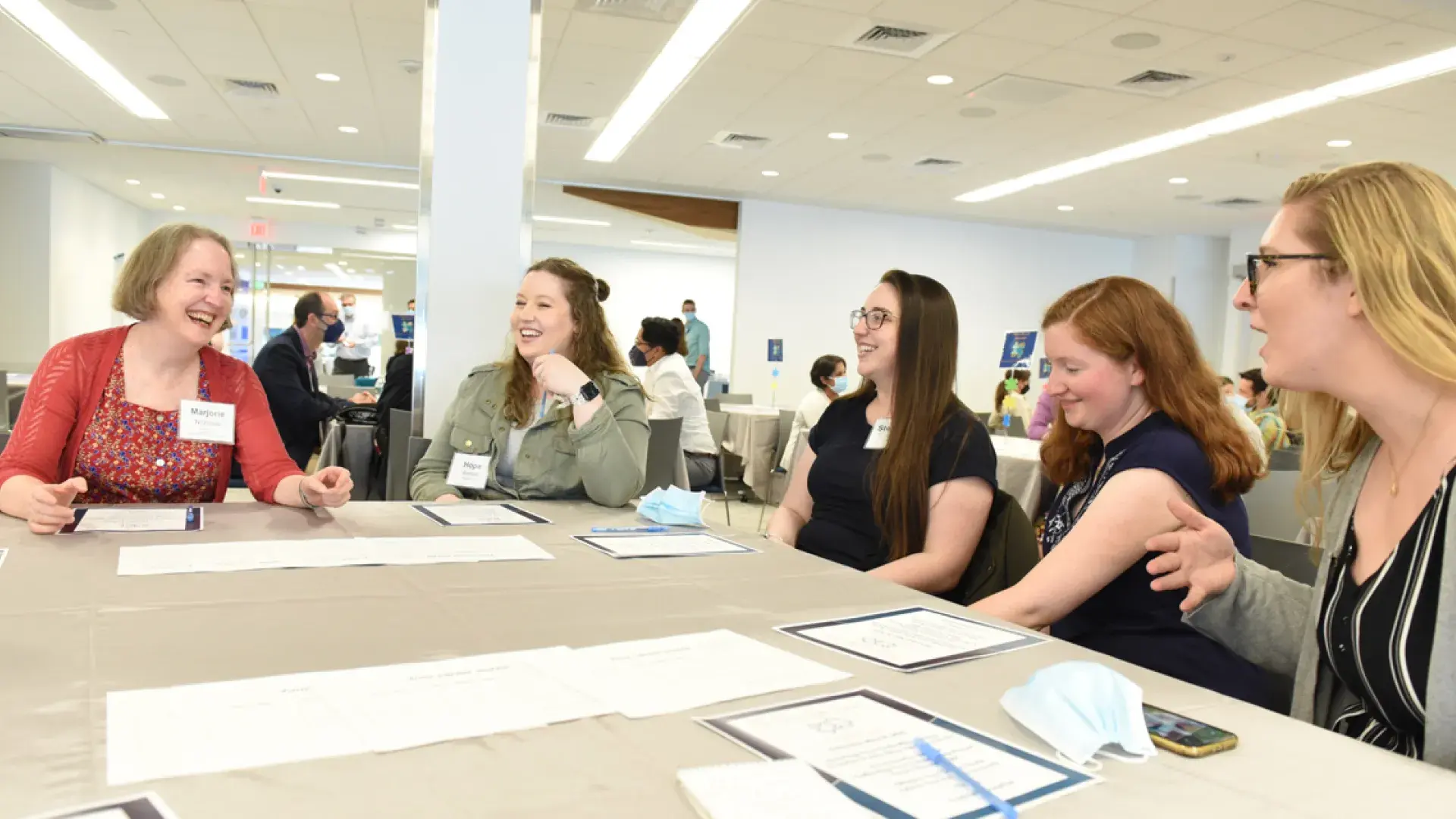 Photo of CSD Chair Dr. Marjorie Nicholas (far left) talks with Class of 2020 speech-language pathology graduates Hope Kentala, Stephanie Gaglini, Sarah Blushi, and Alexandra Lovric.