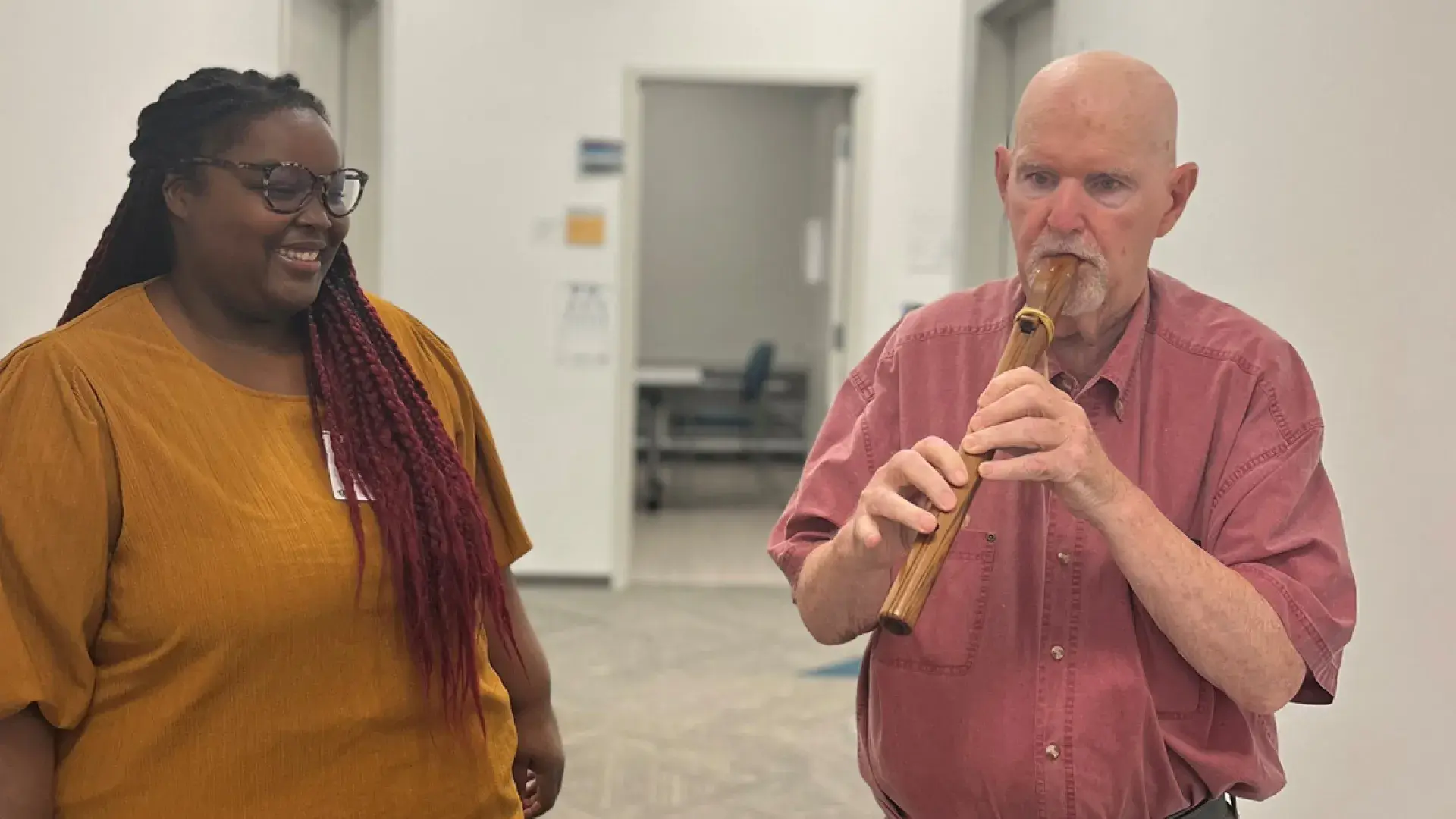 SLP student Simone Moss works with Aphasia Center client Leo Ross.