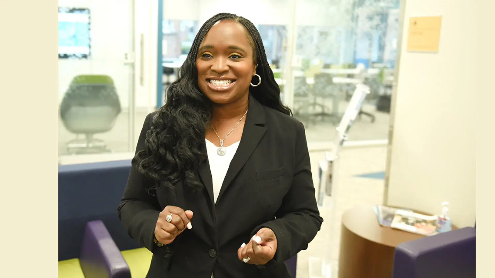 latoya grins and looks off camera