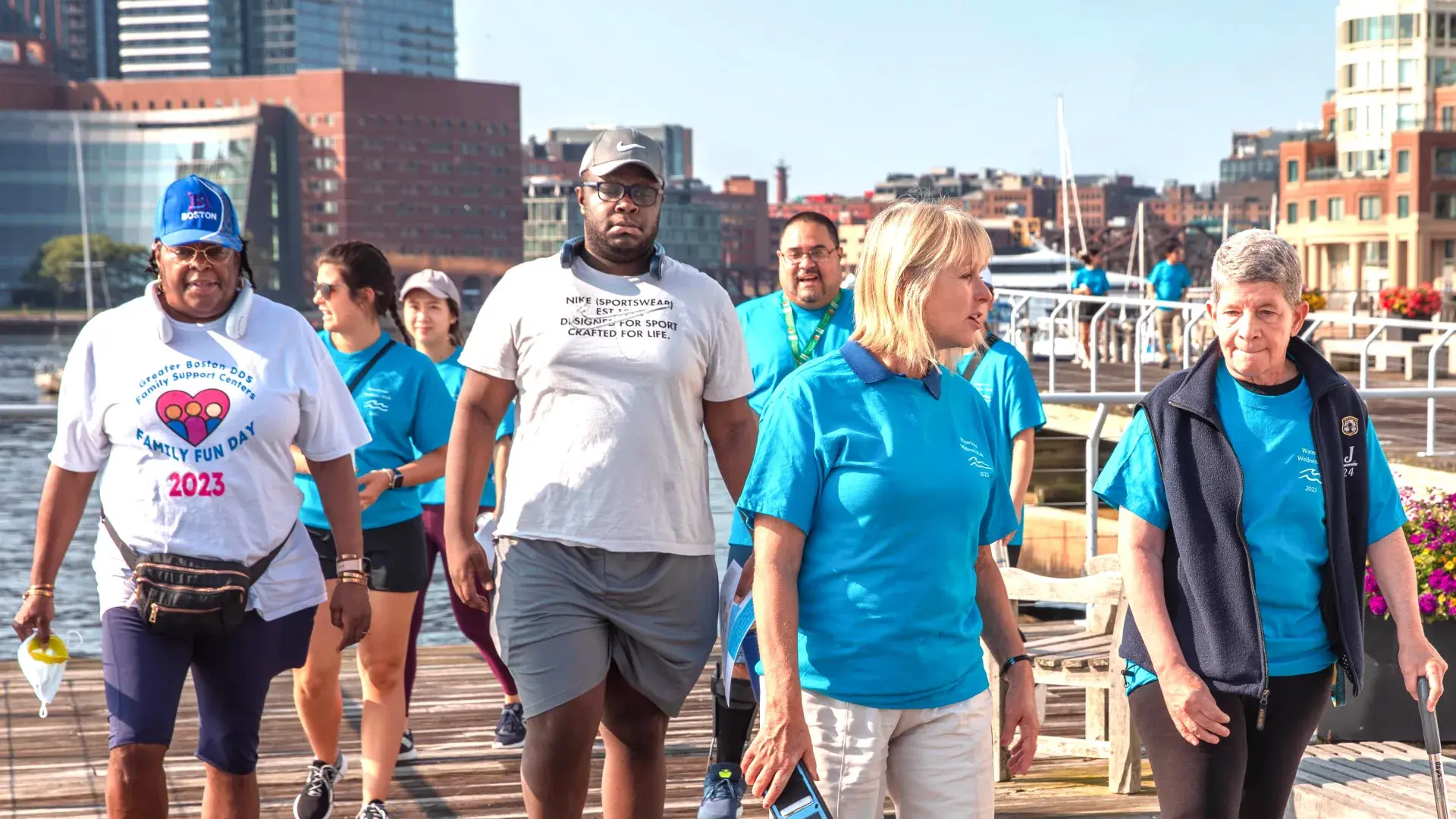 People walking on a pier