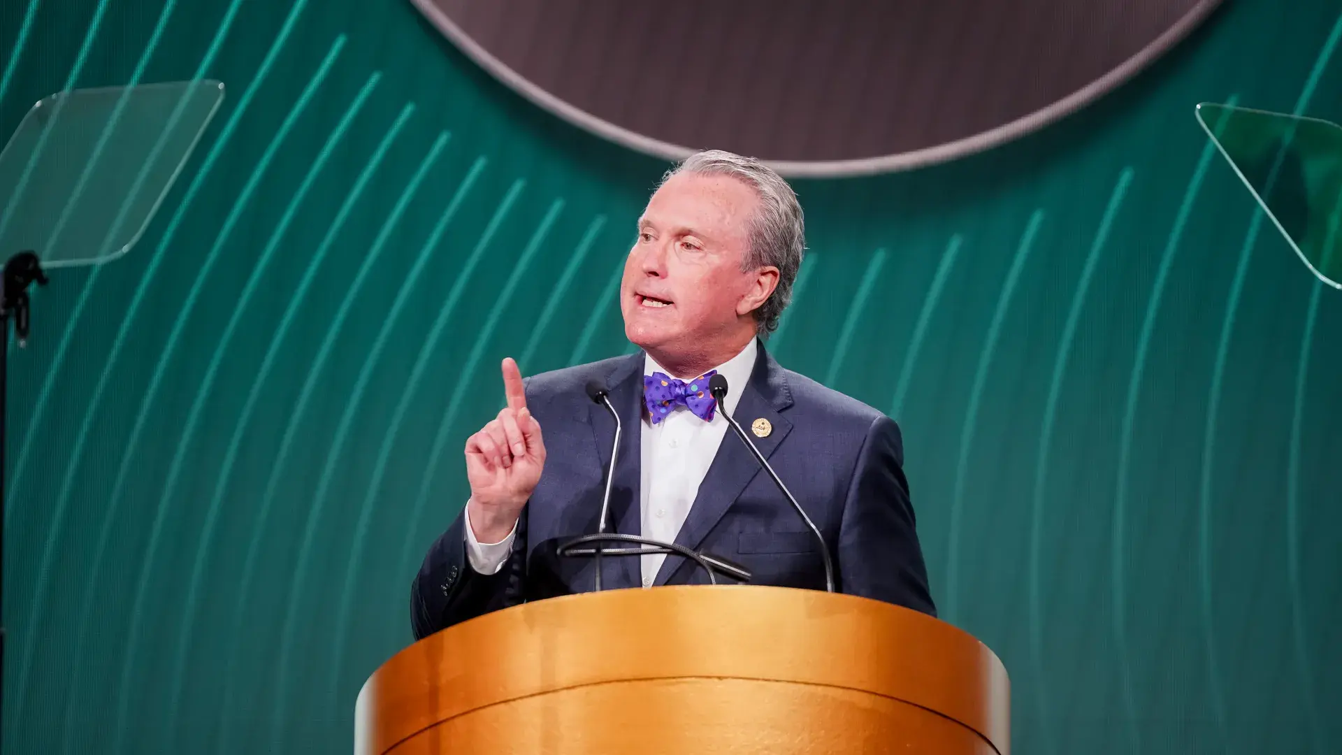 Man speaking at podium