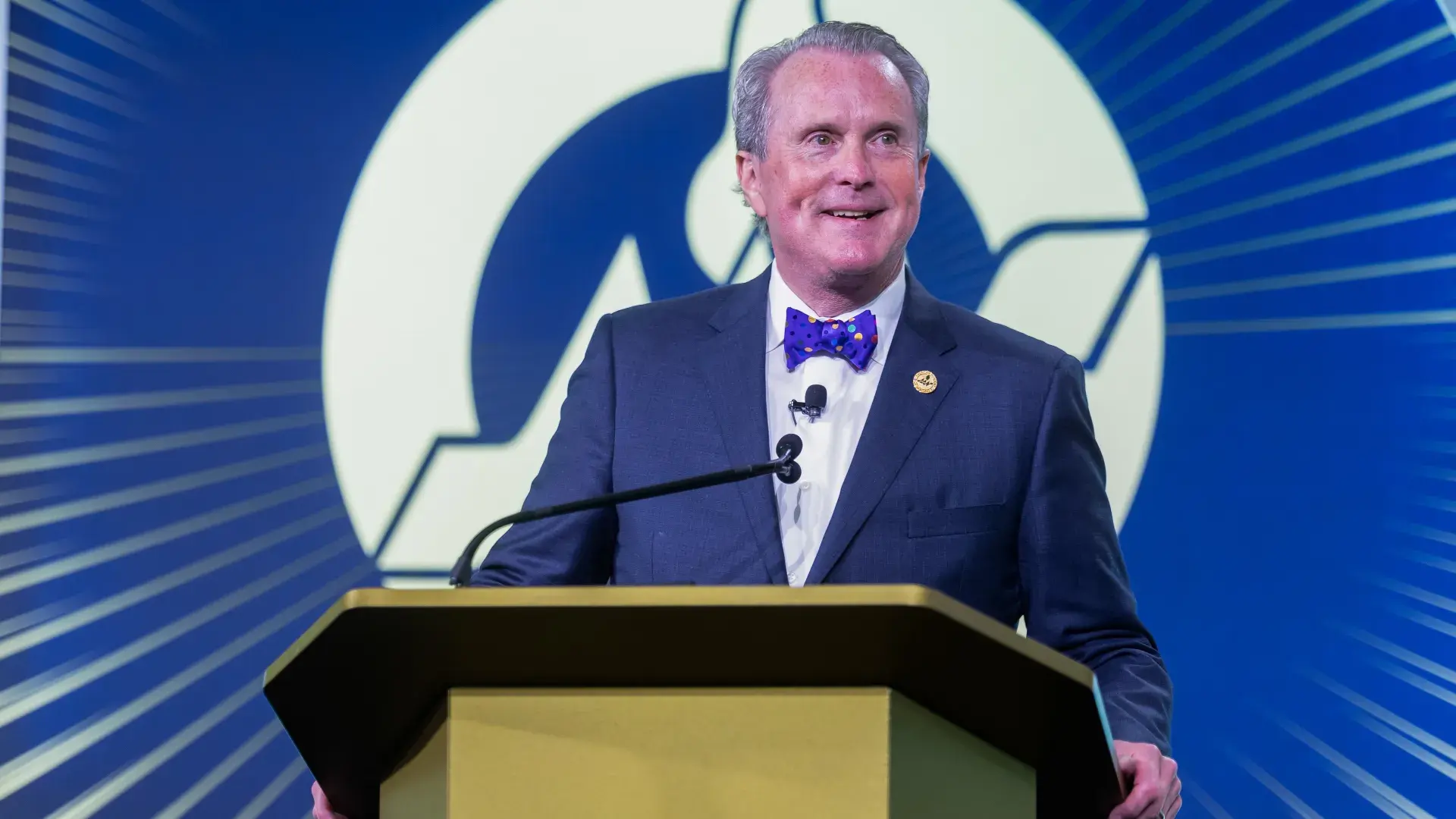 Man speaking at podium