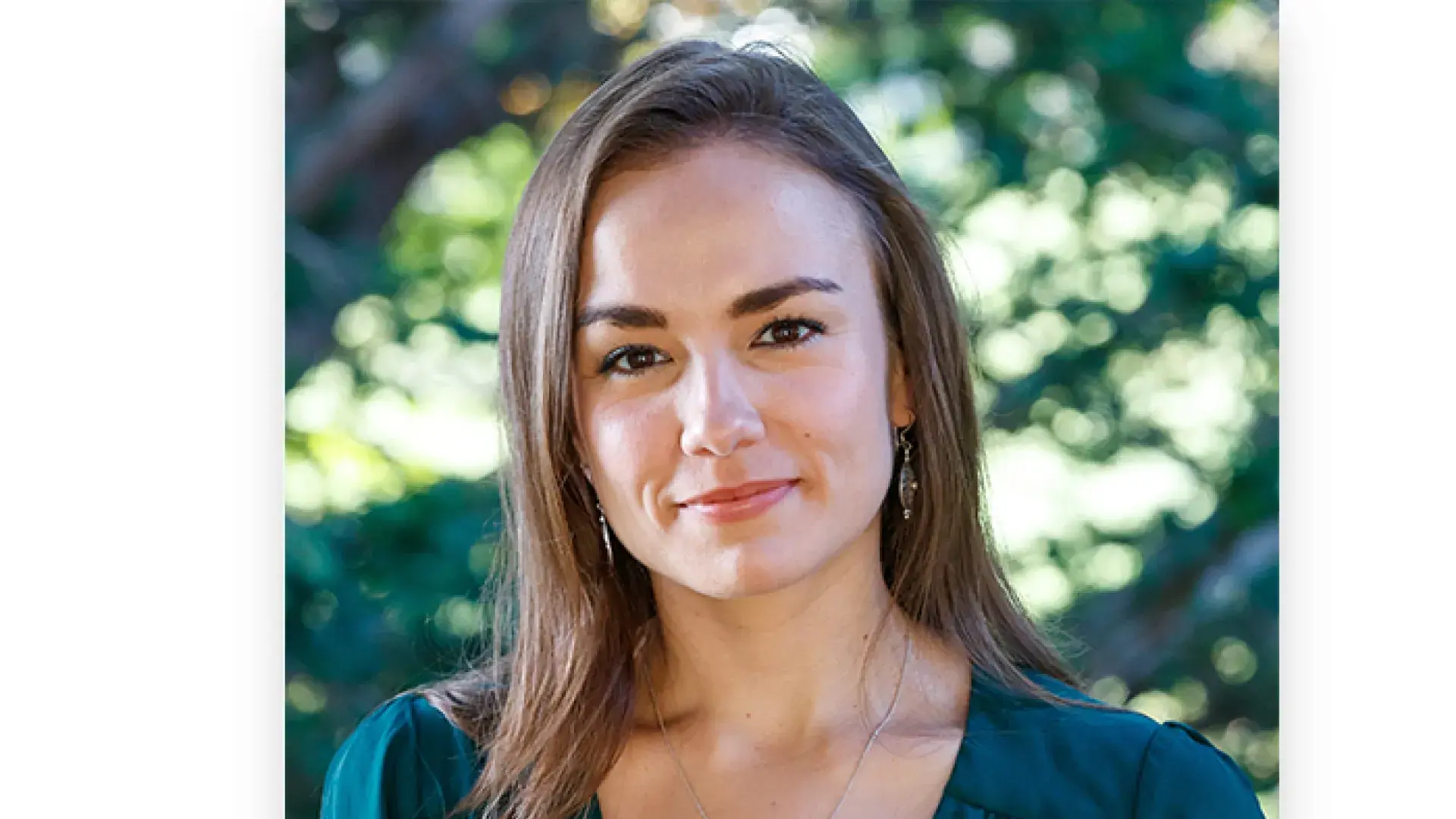 woman smiles for headshot