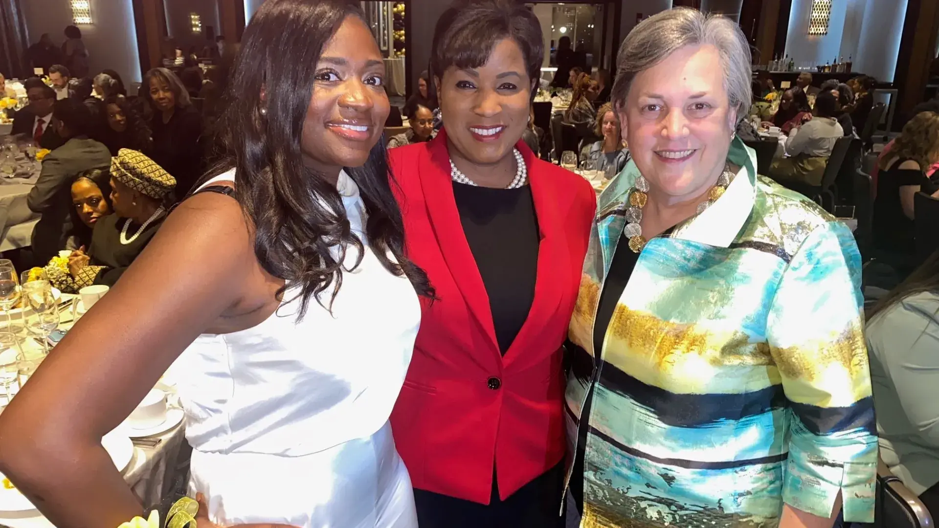 3 women smiling