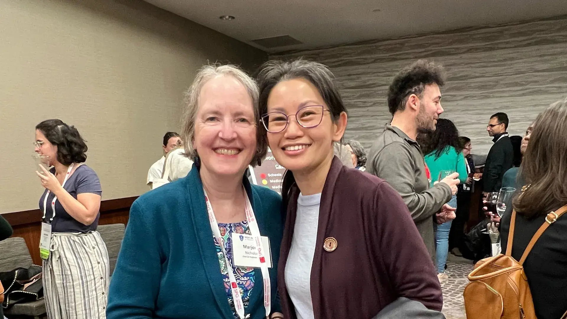 two women smile 