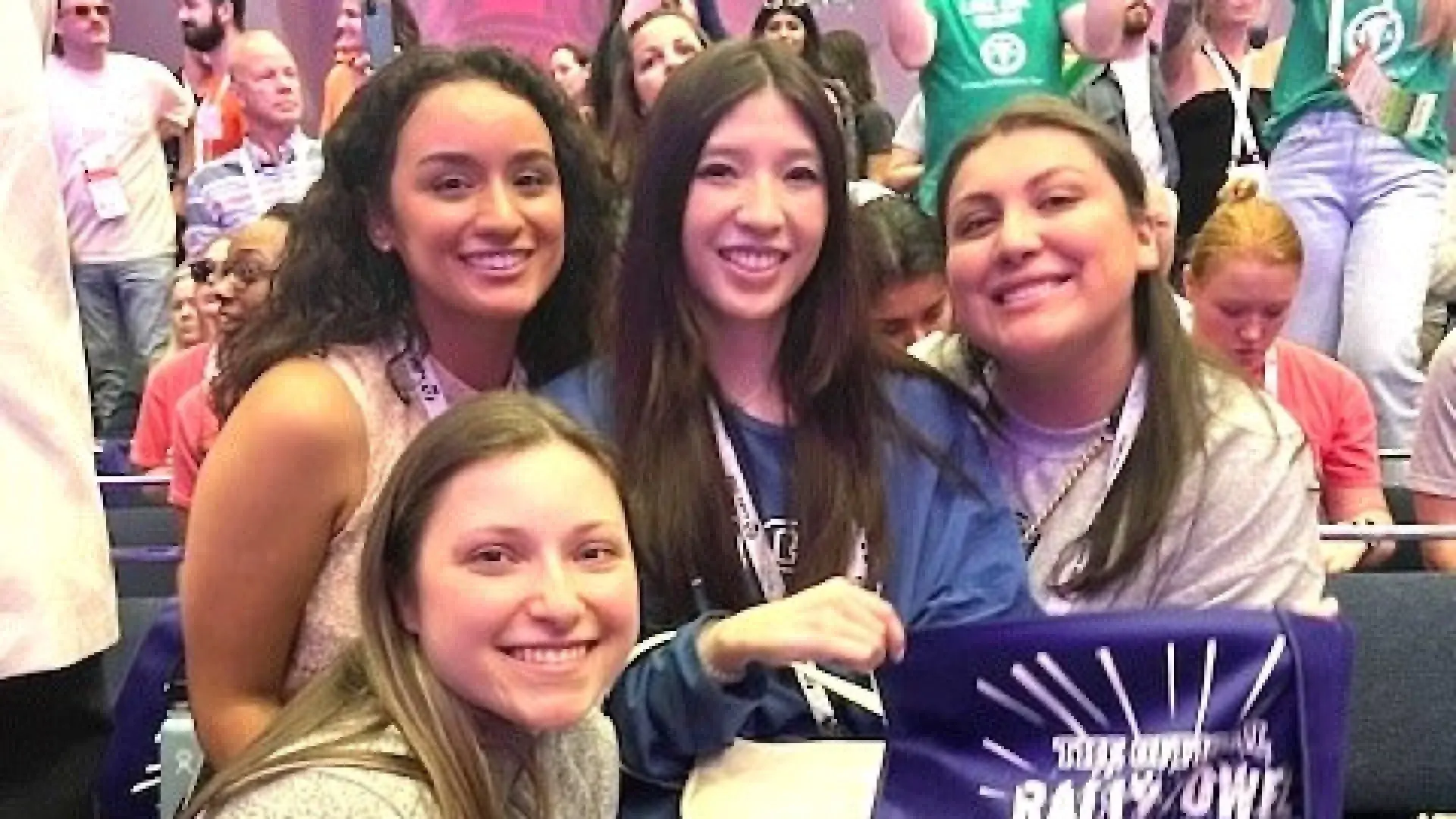 Four women smiling