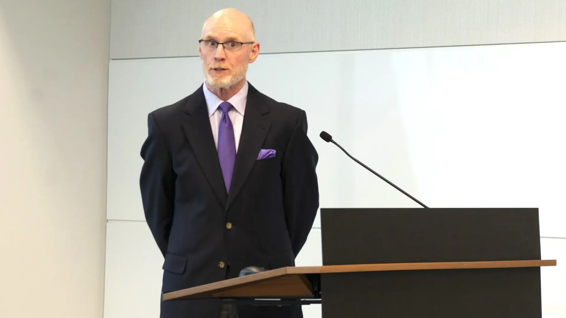 Man speaking at podium