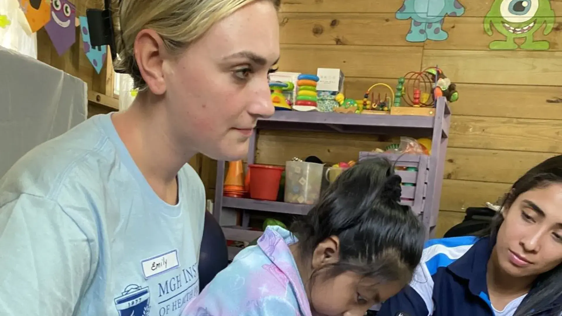 Student treating child patient 