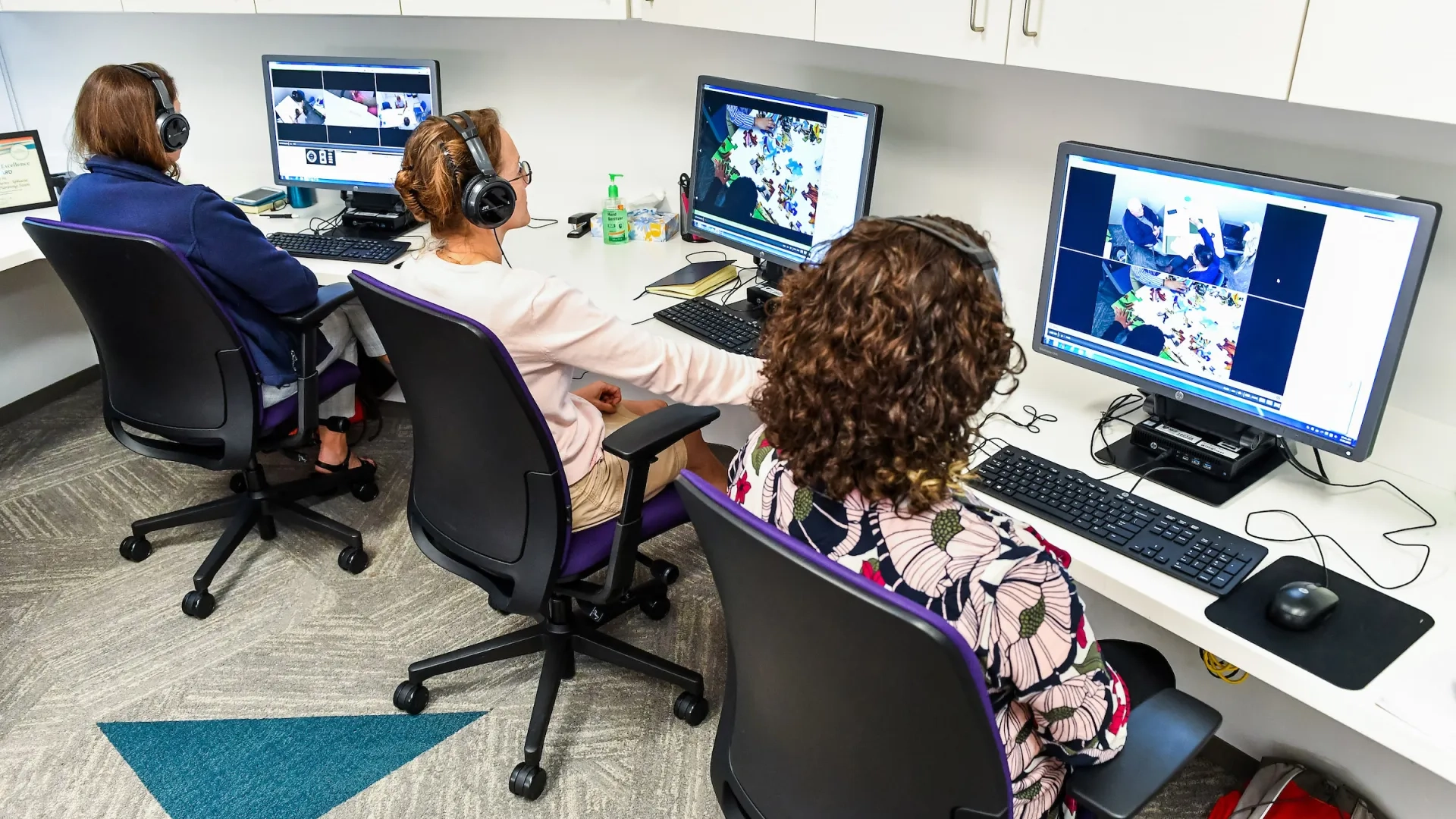 people monitor a screen to help assess students and set forth Individualized Education Programs (iep's)