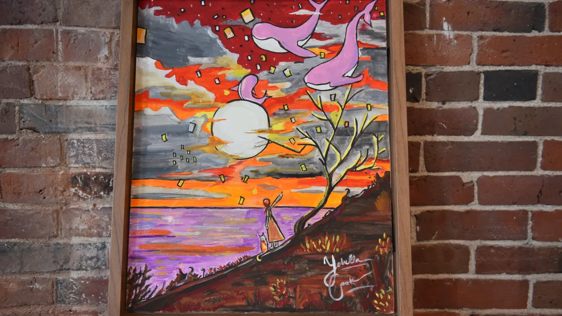 A painting of a sunset with whales