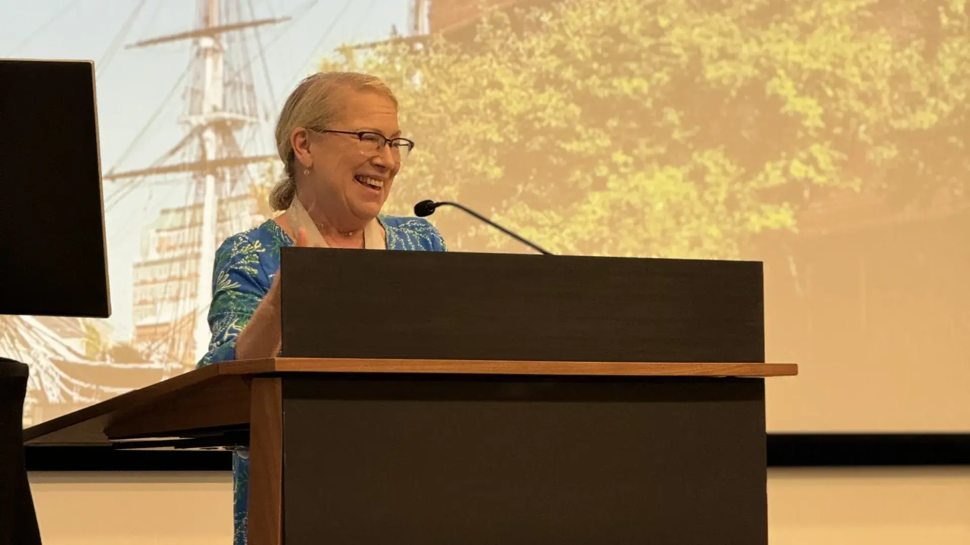 woman at podium 