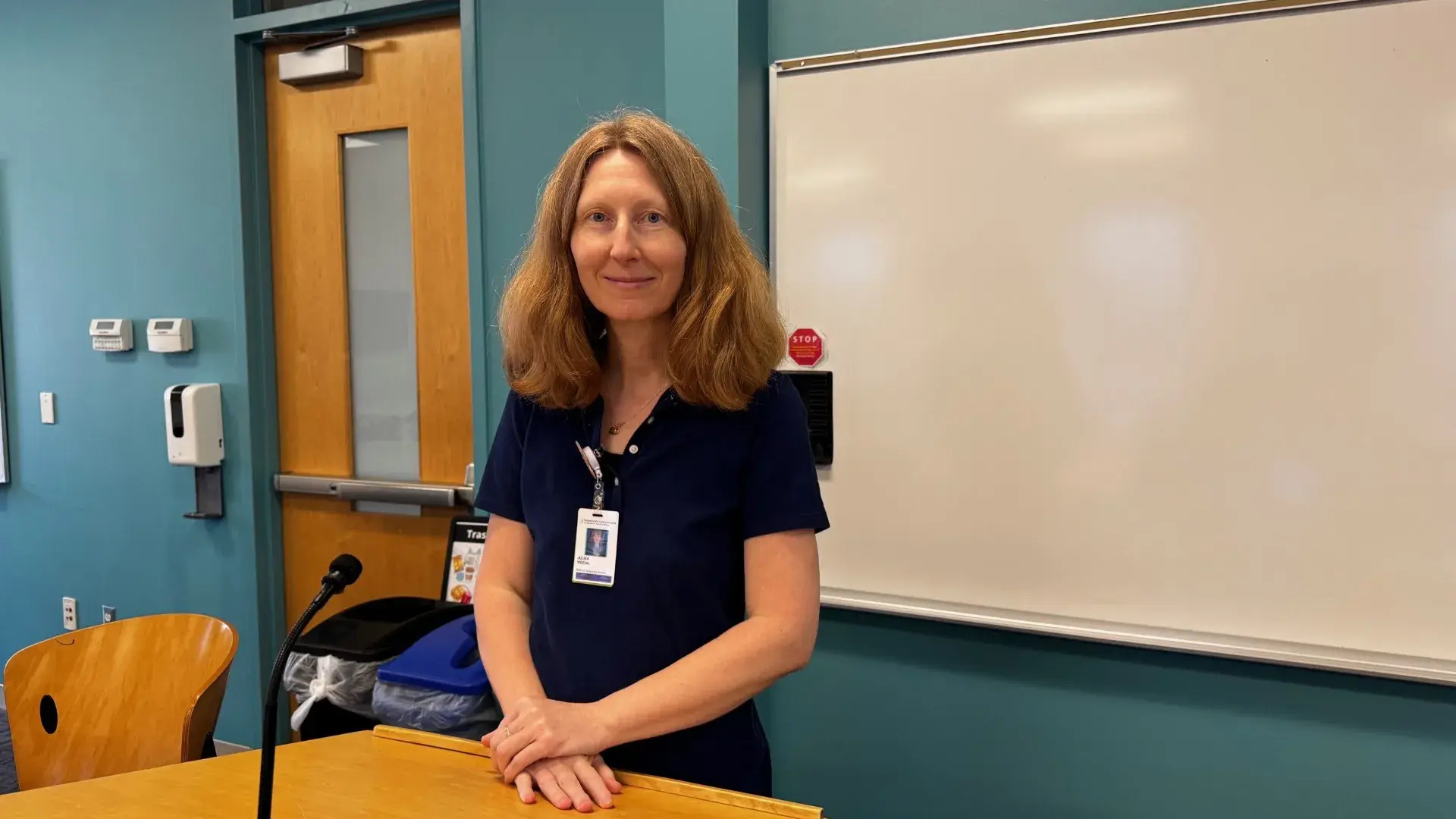 Woman standing at podium