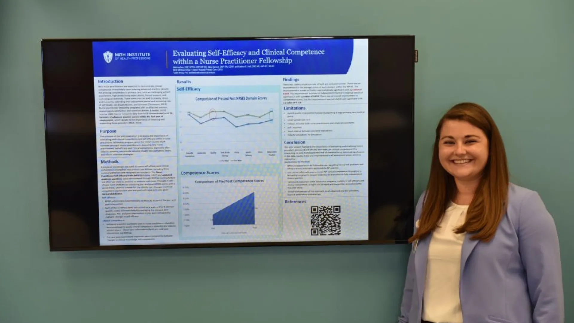 woman standing in front of a screen