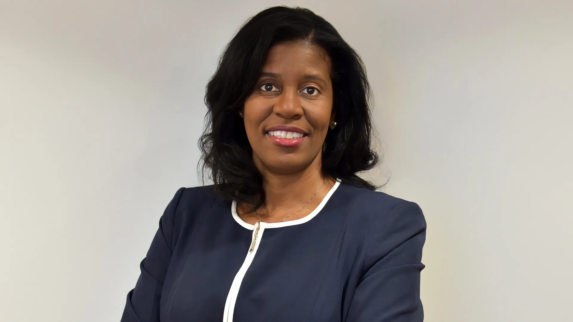 Professional headshot of woman in business attire