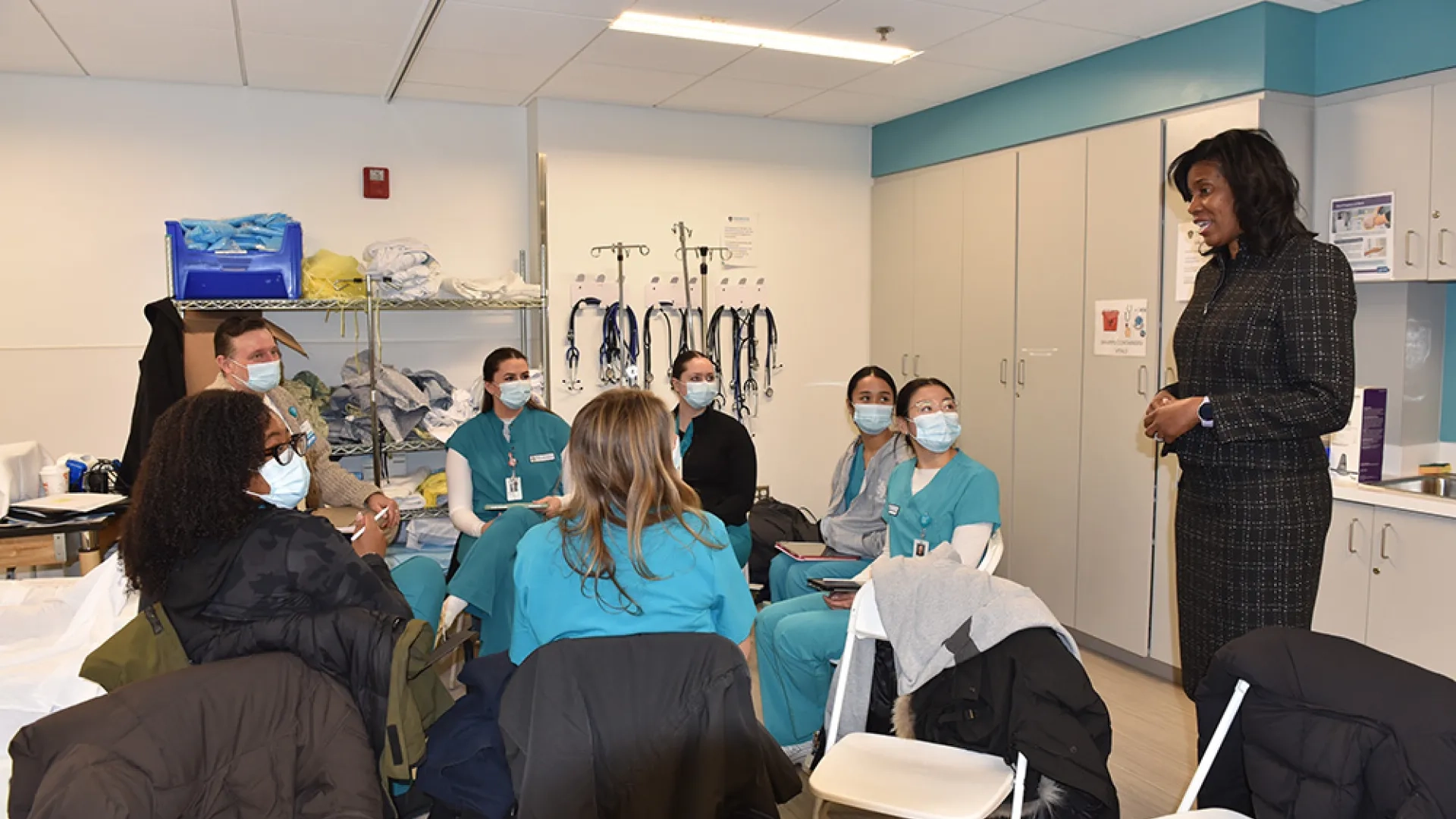 President Deborah Jones speaks to a nursing class in the simulation lab.