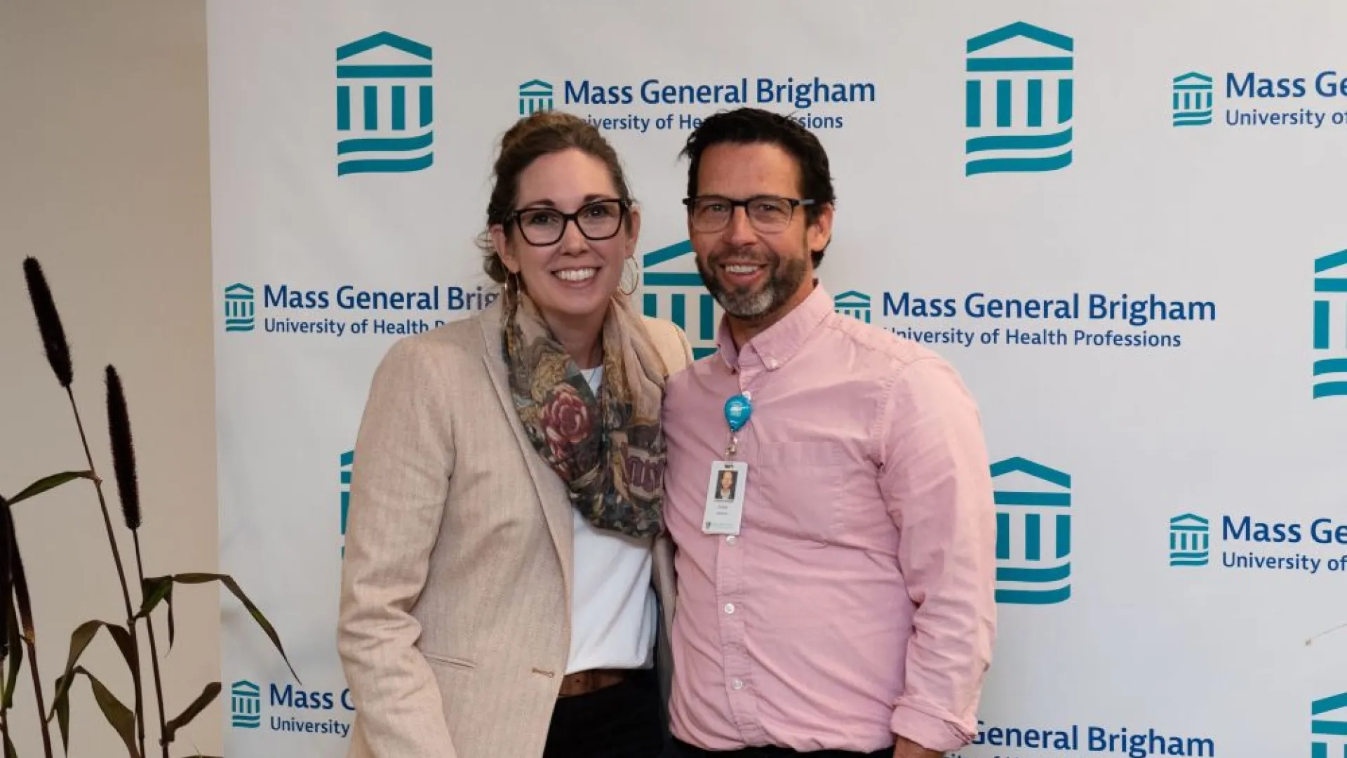 woman with glasses next to man with glasses
