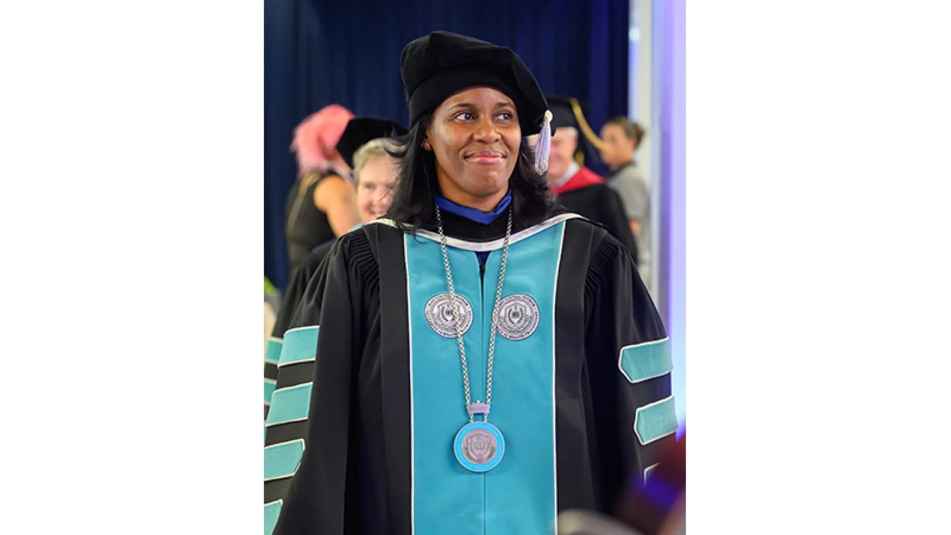 President Deborah J. Jones walks out of the ceremony at the end