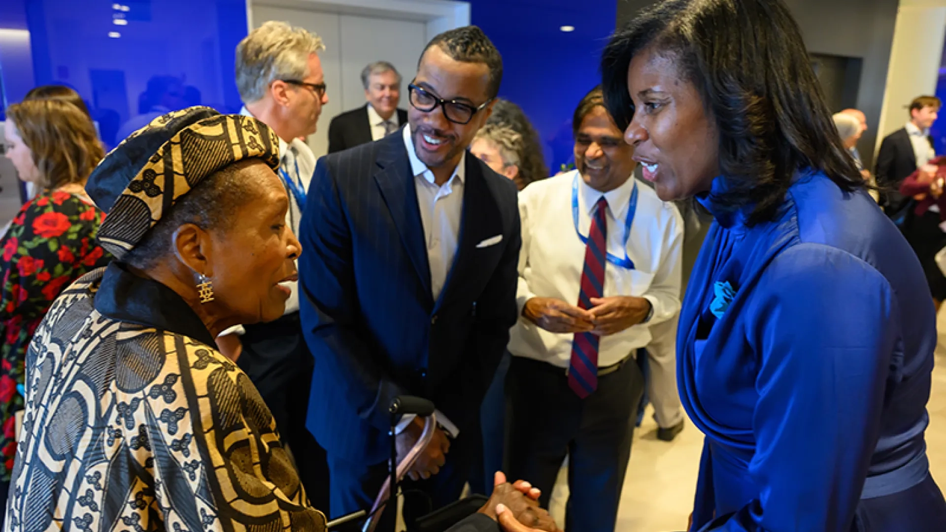 E. Lorraine Baugh (l) shares a word with President Jones and husband Shawn. 