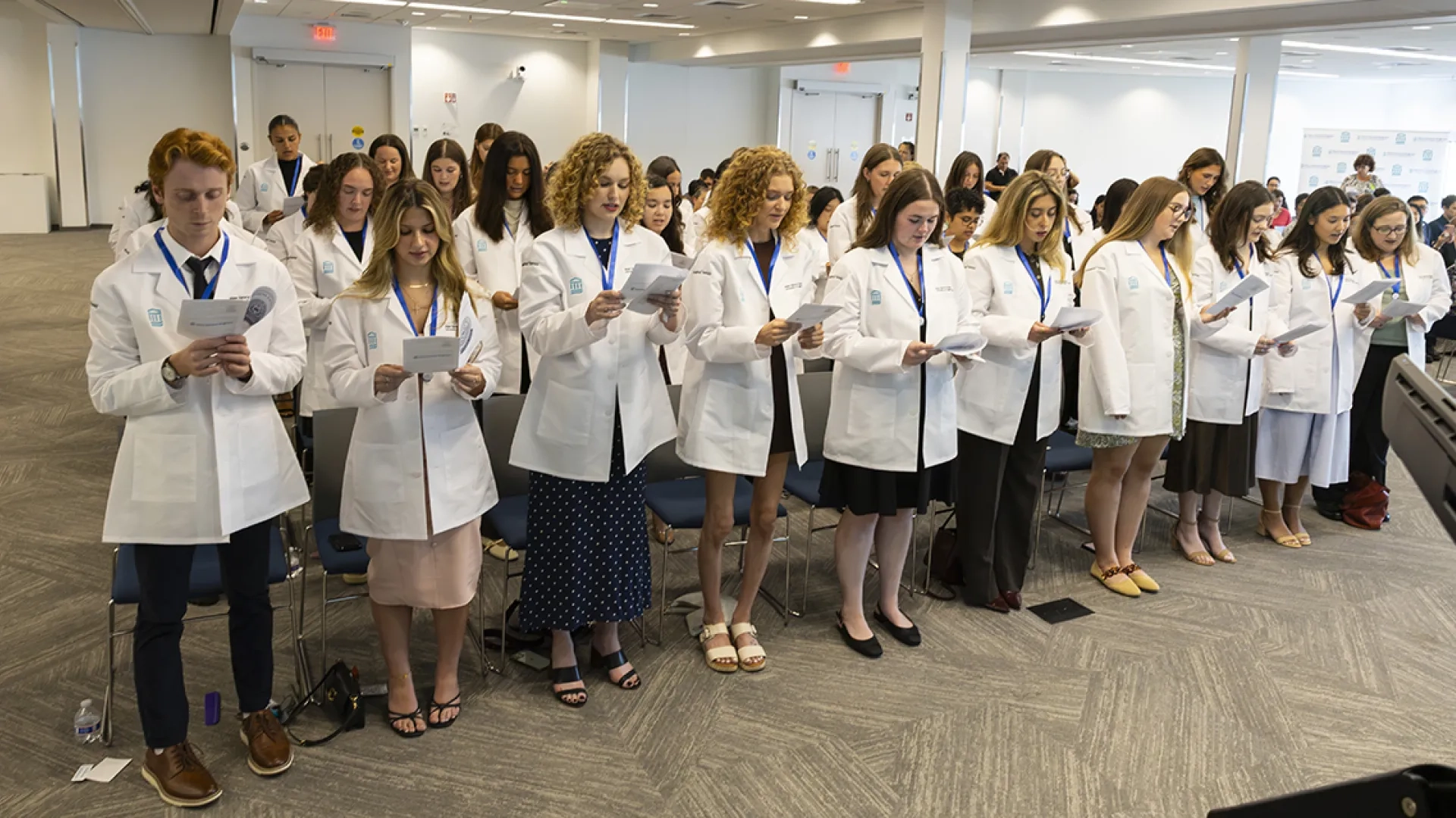 Occupational Therapy students read a pledge at the pinning ceremony