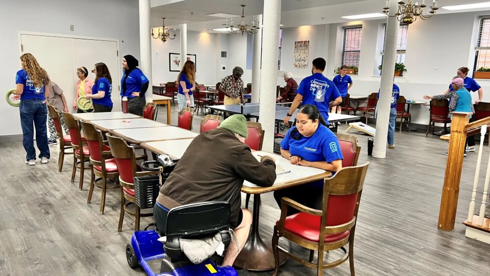 people in a group setting playing games