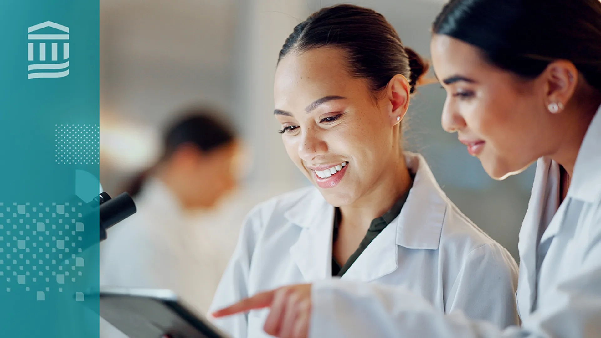 A nursing student reviews patient information on a computer workstation while collaborating with a clinical instructor in a healthcare simulation environment. 