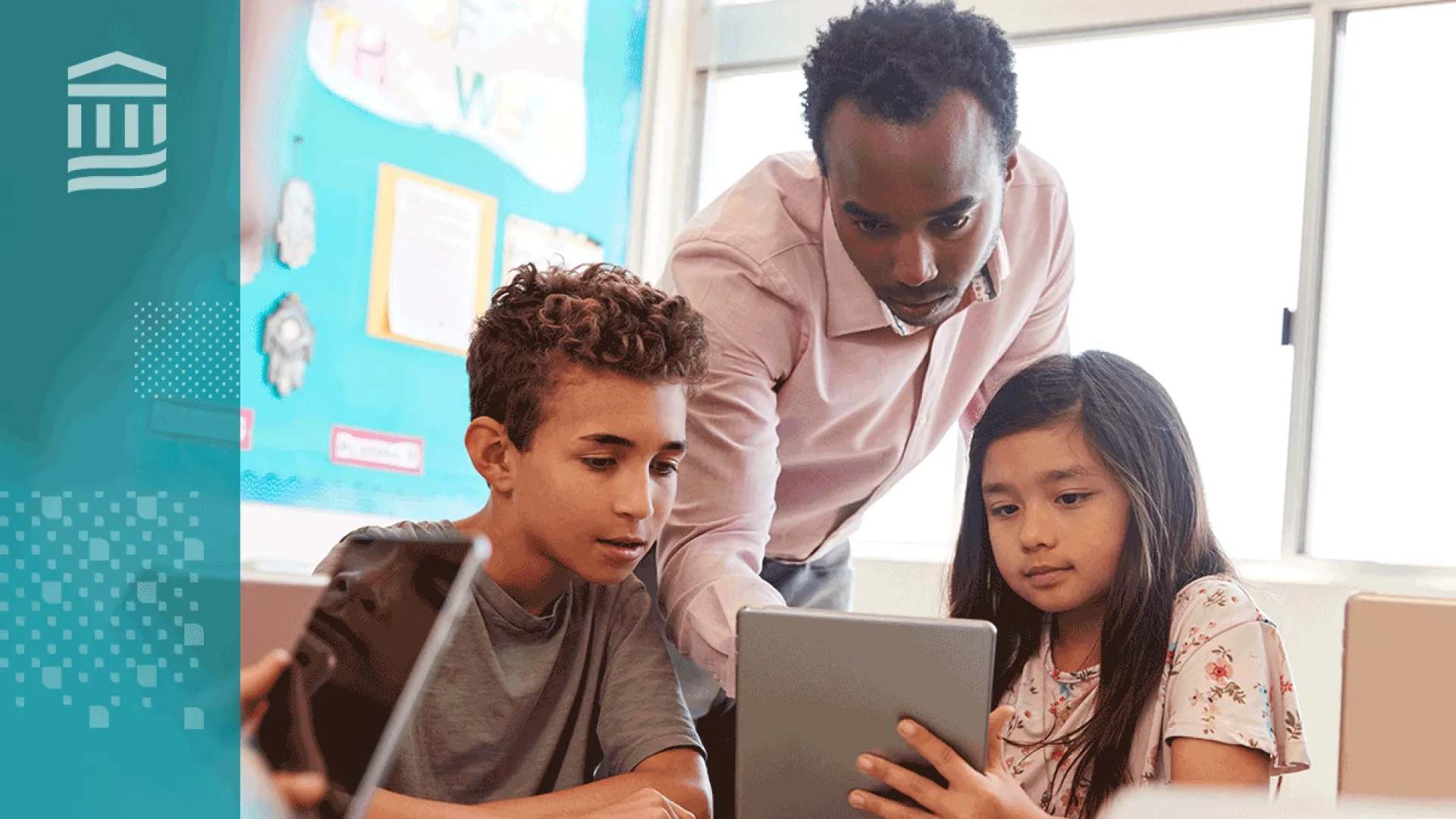 A teacher or speech-language pathologist supports a young student during an early reading activity. 