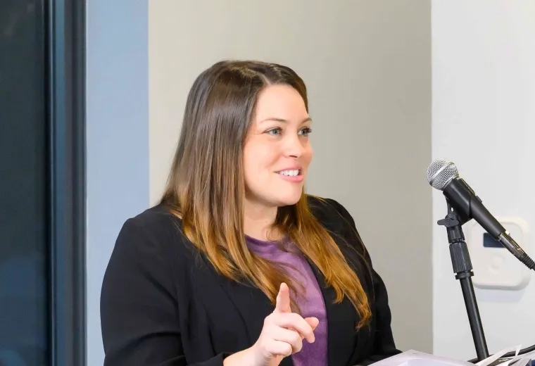 Woman speaking at podium