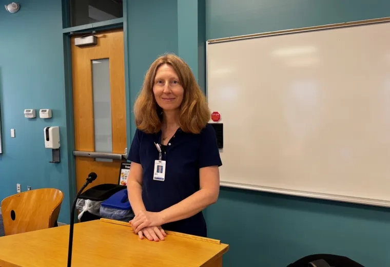 Woman standing at podium
