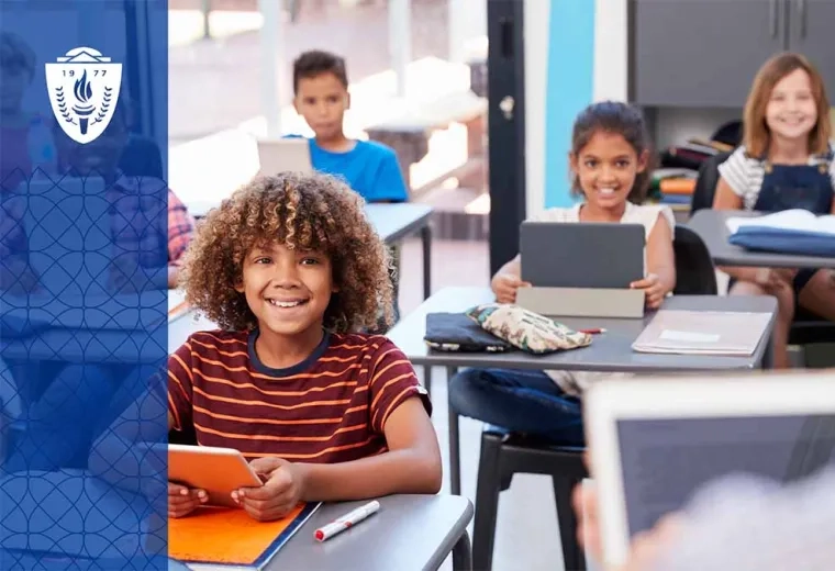 Young kids sitting at desk in a classroom