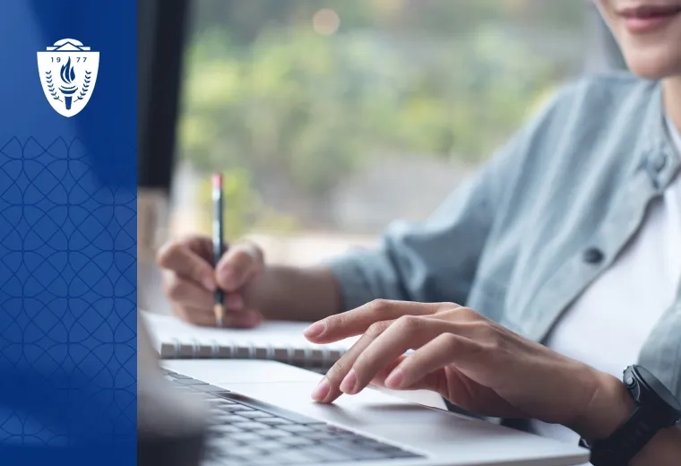woman shows how to write a graduate program application essay on a laptop