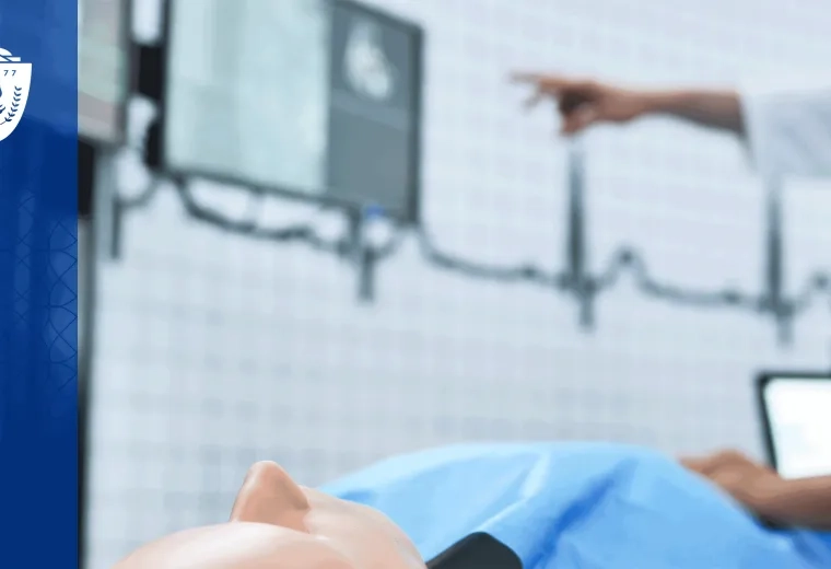 A healthcare simulation mannequin laying on it's back with EKG lines visible on the background