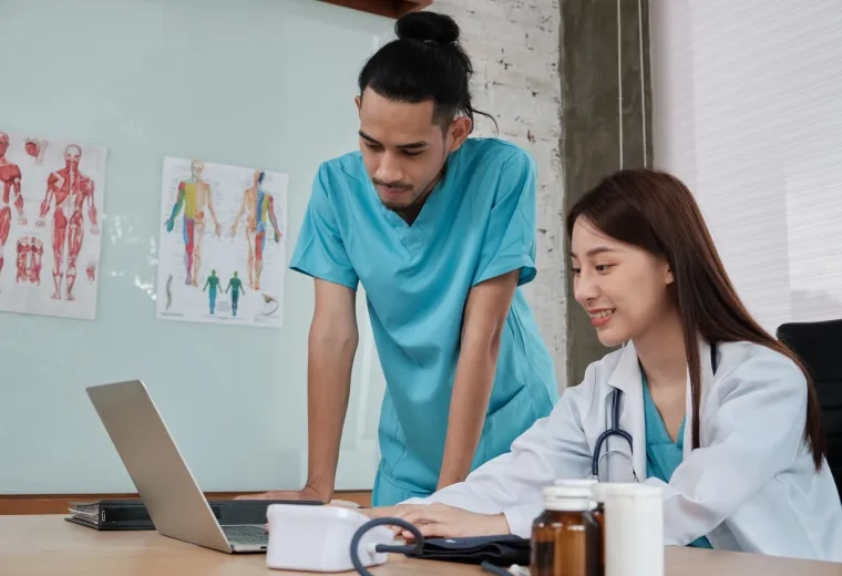 nurse talks to professor