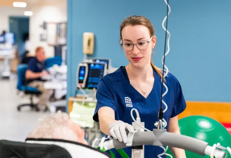 Rehab specialist working with a patient