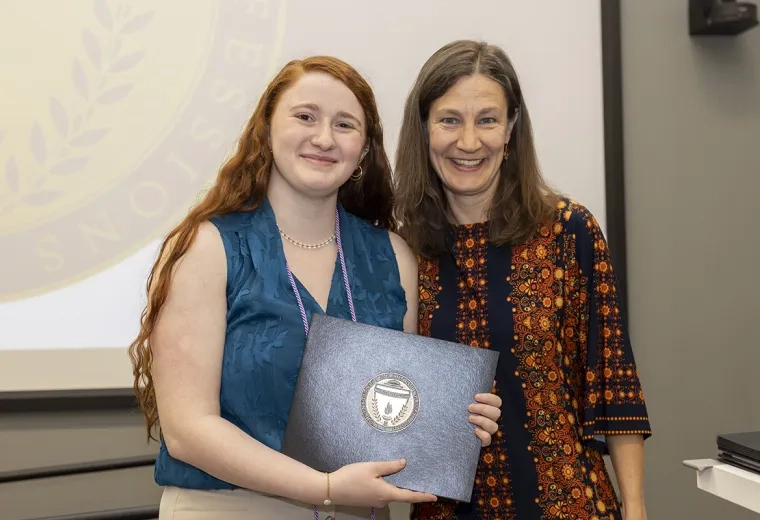 Helen Cohen and Lauryn Zipse pose with the Kenneth N. Stevens Student Research Award