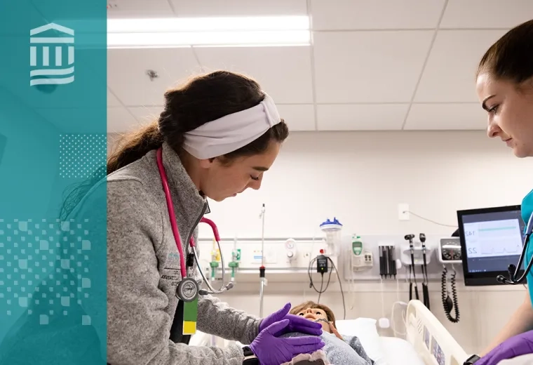 Nursing students at MGH IHP practicing hands-on skills in a simulation lab as part of the ABSN program.