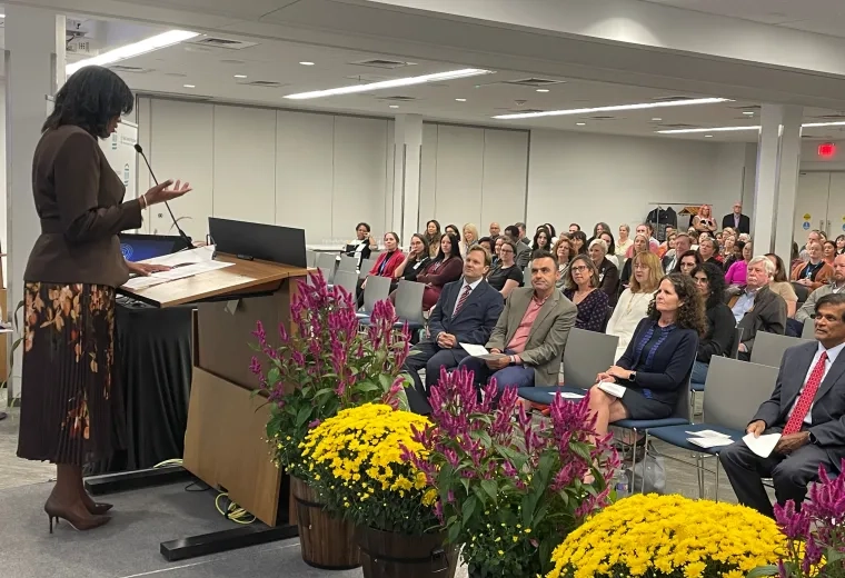 Woman at podium 