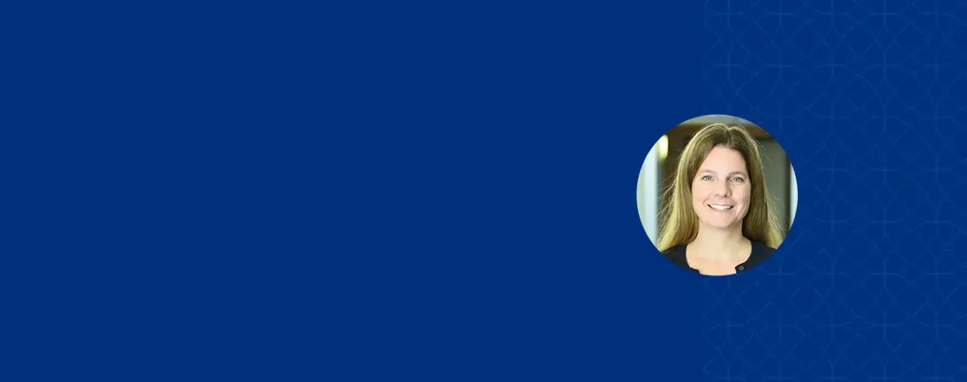 Photo of Cathy Schmidt on a blue background