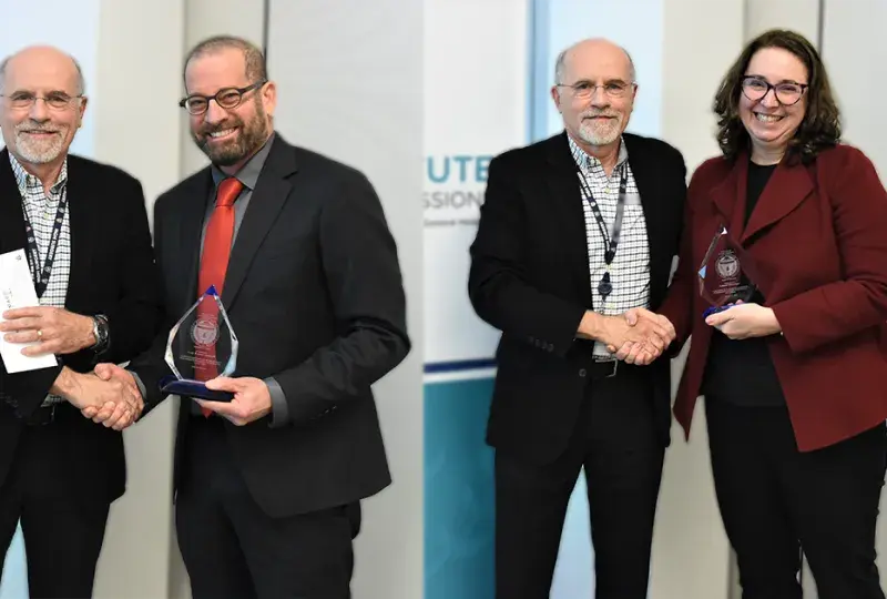 tiffany and jordan each shake hands with dr. hilllman while holding their glass raindrop shaped awards