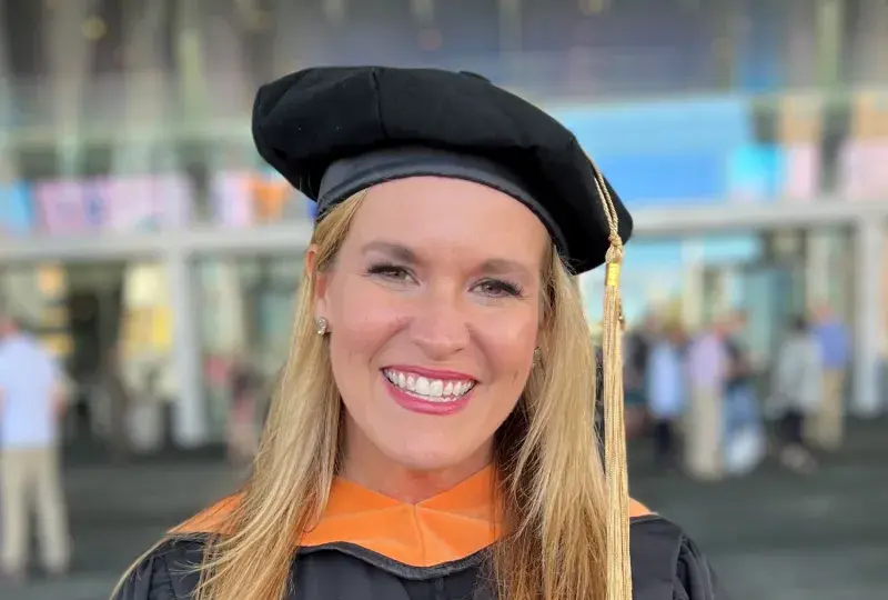 Woman in cap and gown