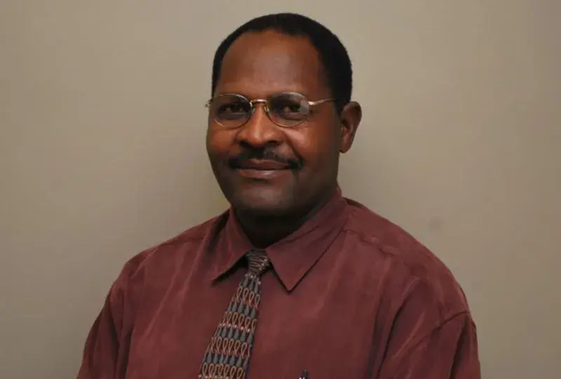 A headshot of a man