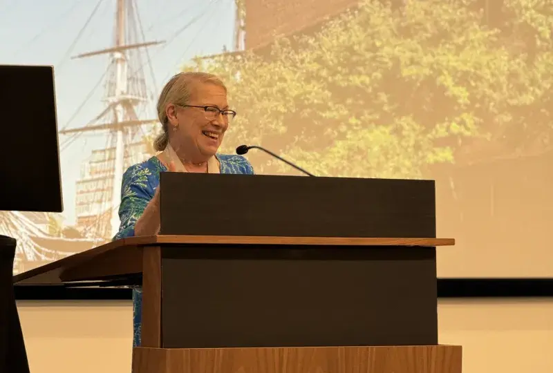 woman at podium 