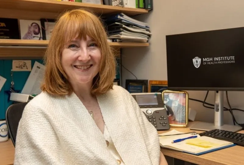 woman sitting at desk 