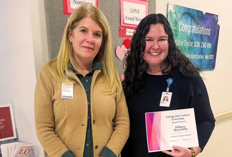 Nantucket Cottage President Amy Lee with Hillary Reynolds holding the L.O.V.E Award certificate 